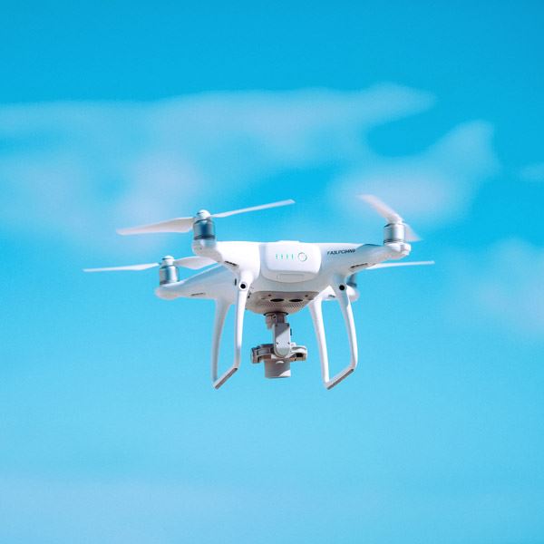 white drone in the sky