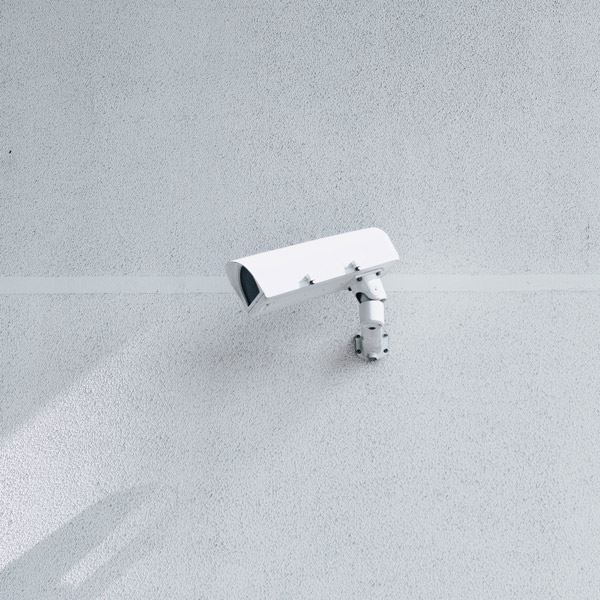 white security camera wall